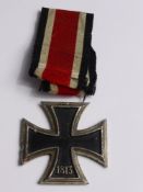 WWII German Iron Cross, 2nd Class with the original ribbon.