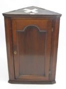 A Georgian Mahogany Corner Cabinet, with two internal shelves, approx 58 x 30 x 85 cms