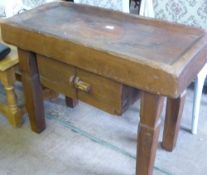 An Antique Oak Butchers Block, the block carved with a fish and a spice cupboard below.