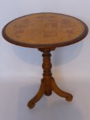 An Antique Occasional Table, the table having a pyrogravure top depicting a Coat of Arms.  The table