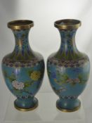 A Pair of Chinese Cloisonné Vases, the vases having a turquoise background depicting