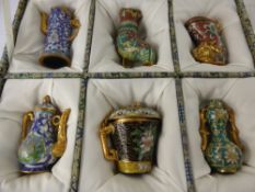 A Collection of Chinese Character Cloisonné Vessels, in various designs including tea pot, coffee