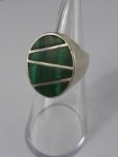 Two Silver and Malachite Rings, circa 1970, the first of oval design inlaid with silver size S,