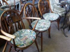 Four Ercol Kitchen Chairs, and two carvers, all with Sanderson Cascacs fabric covered cushions. (6)