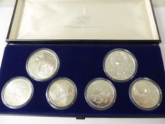 A XXII Olympiad Moscow 1980 Silver Proof Presentation Coin Set, approx 140 gms together with a