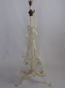 A White Painted Wrought Iron Lamp Stand on tripod base approx 131 cms overall length.