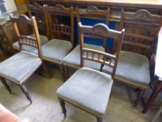 Ten Edwardian Dining Chairs, Draylon upholstered with turned legs and casters.