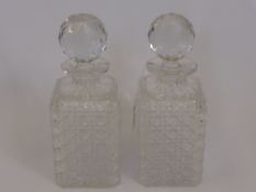 A Pair of Cut Glass Crystal Whisky Decanters, approx 24 cms high.