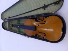 A Vintage Violin, in the original case, restoration required, no label.