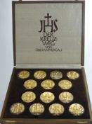 A Boxed Limited Edition Coin Set entitled Der Kreuzweg von Oberammergau, containing fourteen
