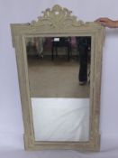 An Antique Wood Carved Mirror, with leaf scroll decorative carving to frame and mounting. Original