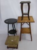 A Cane Square Two Tier Occasional Table, approx 45 x 45 cms, an ebonised round occasional table,