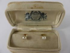 A Pair of Gentleman's 9ct Pearl Dress Studs, in the original box, m.m D & Co, approx 2 gms