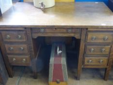 An Oak Office Desk, three drawers to either side, approx 127 x 81 x 77 cms