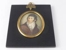 An 18th Century Miniature portrait of a gentleman, initialled R.C. dated 1795.