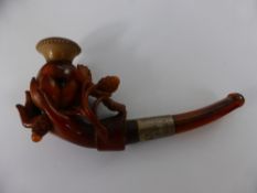 An Antique Amber Meerschaum Pipe, the pipe in the form of a hand clasping a lotus flower, in