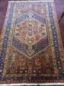 A Middle Eastern Woollen Rug, having central medallion, approx 204 x 131 cms.