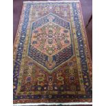 A Middle Eastern Woollen Rug, having central medallion, approx 204 x 131 cms.