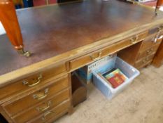 A Vintage Leather Topped Oak Mahogany Fronted Partners Desk, the desk having three doors to top