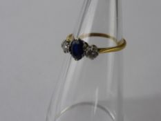 A Lady's 18 ct Gold and Platinum Two Stone Diamond and Sapphire Ring,  sapp 6.5 x 4.7  mms, dia 2