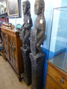 Two Indonesian Hard Wood Dayak Guardian Posts, approx 1.8 m tall.