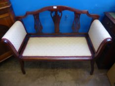 An Edwardian Mahogany Window Seat with lyre back carving and cream upholstery approx 116 x 47 x 85