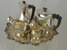 A Silver Plated Tea / Coffee Set together with a silver plated salver.