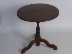 An Antique Oak Tilt-Top Table, on bird cage column and tripod base with swept feet, approx 60 x 63