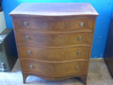 A Reproduction Mahogany Serpentine Fronted Chest of Drawers, having four graduated drawers, approx