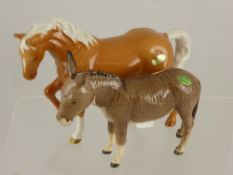 A Beswick Figure of a Palomino Horse (left foot up) together with a donkey