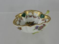 A 19th Century Meissen Punch Cup depicting classical figures to the bowl and floral spray.