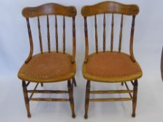 Four Antique Oak Kitchen Chairs, with spindle back and turned legs and stretchers.