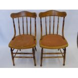 Four Antique Oak Kitchen Chairs, with spindle back and turned legs and stretchers.