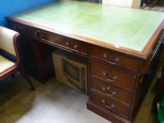 A Large Reproduction Twin-Pedestal Partners Desk, having three drawers with green leather insert,