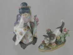 A Lladro Porcelain Figurine depicting a seated Geisha together with a Lladro figurine depicting a