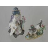 A Lladro Porcelain Figurine depicting a seated Geisha together with a Lladro figurine depicting a