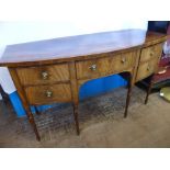 A Georgian Mahogany Bow Fronted Sideboard, the sideboard having a central drawer flanked by two