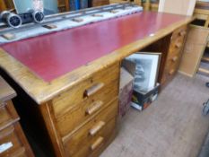 An Oak Vintage Leather Top Partners Desk, having four drawers to side with cupboards to back, approx