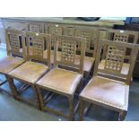 Sid Pollard Set of Eight Oak Dining Chairs, with the back of the seat carved to look like lattice