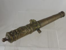 An Antique Model of a French Naval Cannon, approx 49 cms long, engraved  "Le Duc Tre", raised