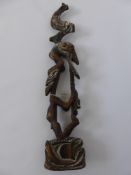 A Sepik River Papua New Guinea tribal piece trimmed with cowrie shell.