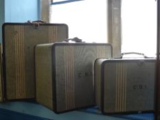 A Collection of Three Vintage graduated Revelation Canvas Suitcases, some with Pan Am transit