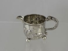 A Victorian Silver Creamer, embossed with Aesop's fable 'The Fox and the Crane",  London hallmark,