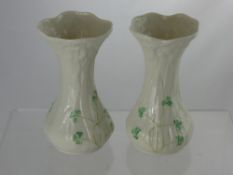 A Pair of Belleek Vases, with back stamp to the base, approx 16 cms.