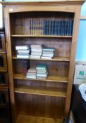 A Contemporary Pine Book Case with four shelves.