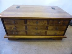 A Laura Ashley Chestnut Garrat Media Chest, with several small drawers to the front.