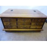 A Laura Ashley Chestnut Garrat Media Chest, with several small drawers to the front.