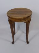 An Oriental Rosewood Plant Stand, on cabriole legs.