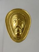 A 14 ct Yellow Gold Tested Tribal Mask Brooch, wt 18 gms.
