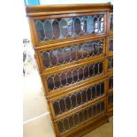 A Globe Wernicke Co. Ltd., Stacking Book Case, the mahogany inlaid case having astral glazed door